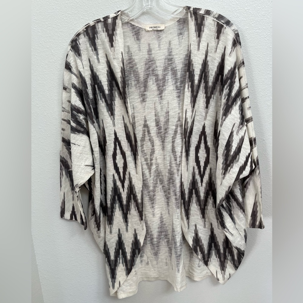 Promesa Cardigan Sweater. Off‎ white with black design.